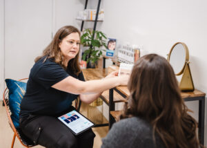 Kat having a detailed skin consultation in the clinic on Walton Street in Jericho